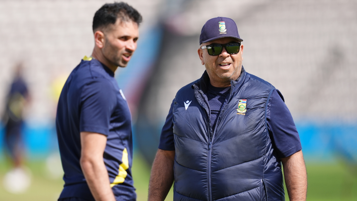 Shukri Conrad with Keshav Maharaj