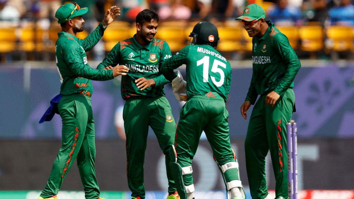 Mehidy Hasan Miraz celebrates a wicket with Litton Das and others