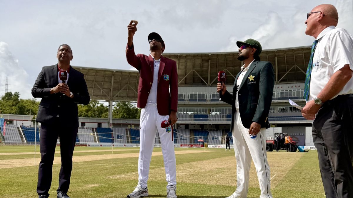 Roston Chase and Babar Azam at the toss