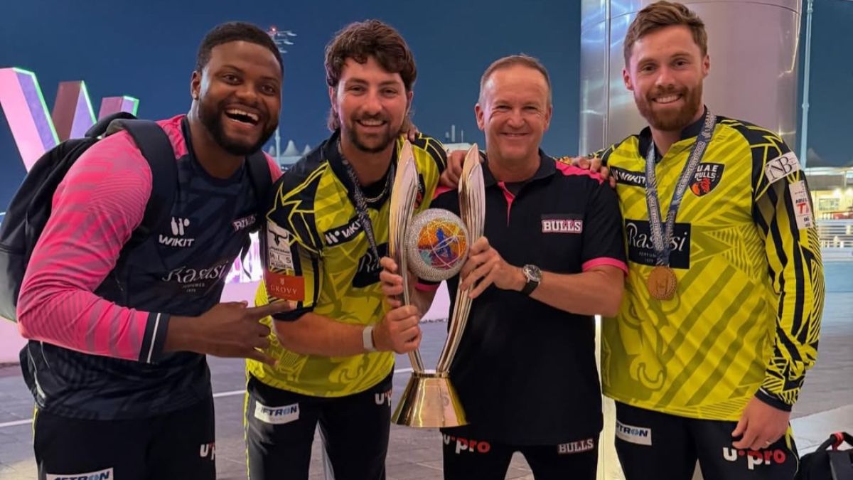 Romario Shepherd, Tim David, Andy Flower, Phil Salt celebrate with Abu Dhabi T10 league trophy (Source: Instagram/@t10league)