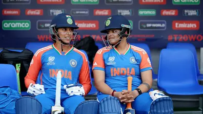 Smriti Mandhana and Shafali Verma sitting in the dugout