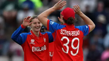 Charlie Dean celebrates a wicket with Nat Sciver-Brunt