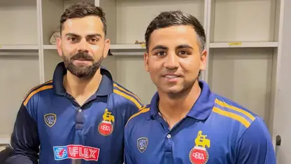 Arpit Rana with Virat Kohli