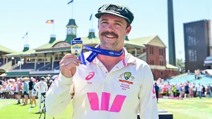 Travis Head poses with his Player of the Match medal at the end of the New Year's Test in Sydney