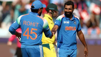 Mohammed Shami celebrates wicket with Rohit Sharma (Source: ICC)