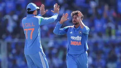 Kuldeep Yadav celebrates with Shubman Gill