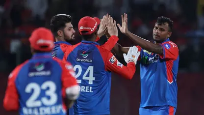 T Natarajan celebrates a wicket with DC teammates